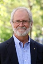 Prof. Patrick Deane (President of the Governing Council)